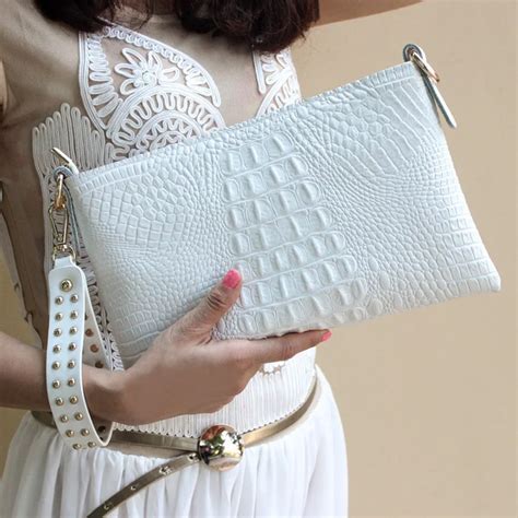 Designer Pouches & Clutches for Women .